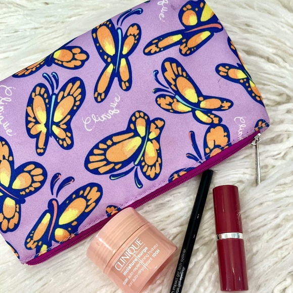 Clinique Other - Clinique "Cosmetic bag in Butterflies with Goodies" NWT